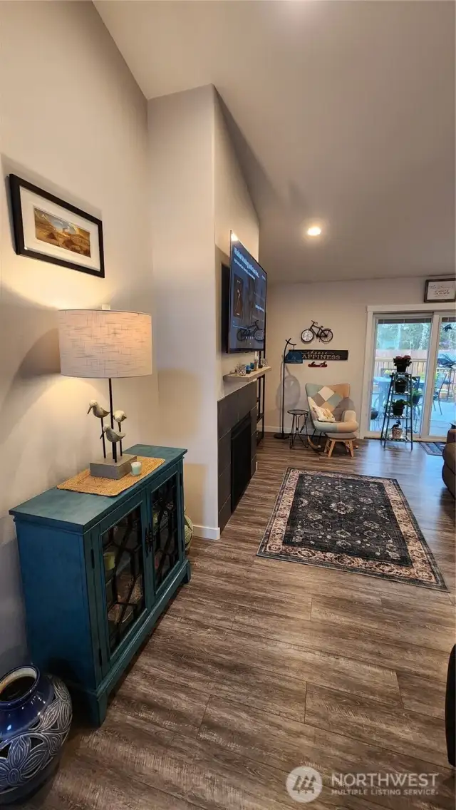 As you enter the front door, you see straight out to the deck and backyard! Primary bedroom and en-suite is on the left side of the home and the 2 guest bedrooms and the guest bathroom is on the right side of the home.