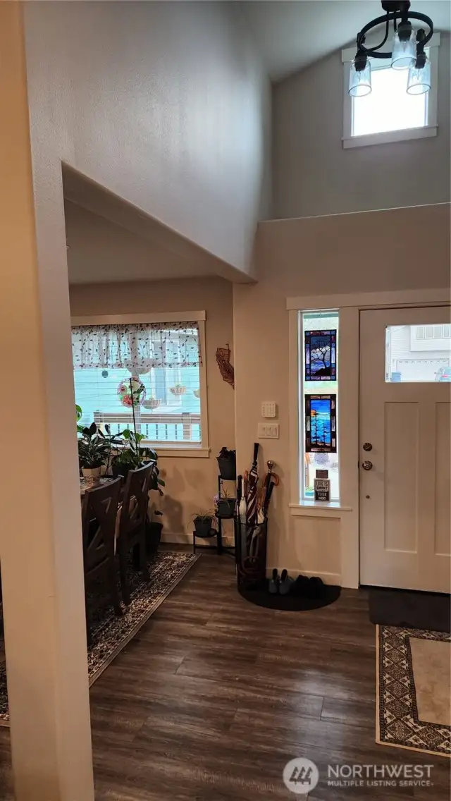 Entry has large window above and a sidelight that let in so much natural light!