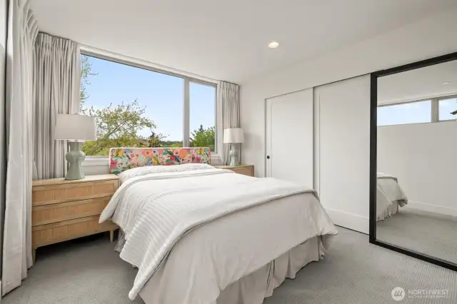 Spacious primary bedroom with ensuite bath.