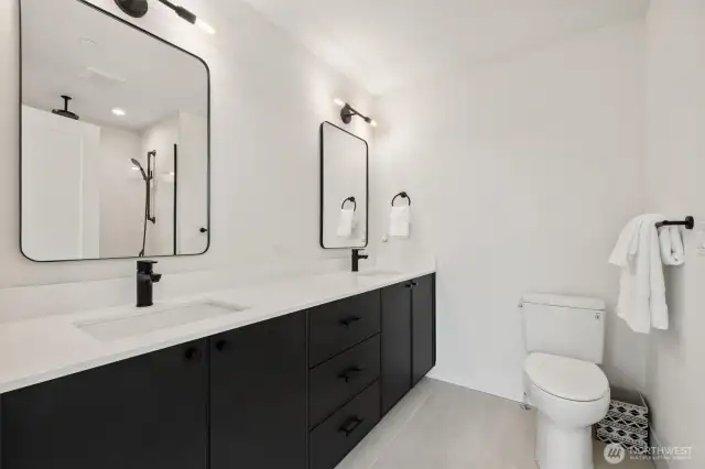 Spa-like primary bathroom - enjoy a double-sink vanity and heated tile floors!