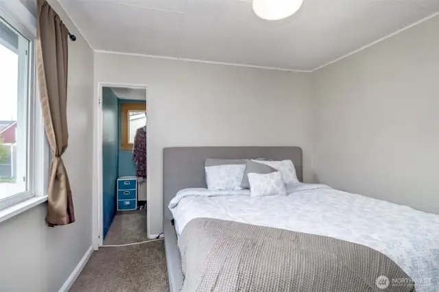 Tucked just behind the bed, you’ll find your own walk-in closet—perfect for organizing clothes, shoes, and maybe even a few hidden treats.