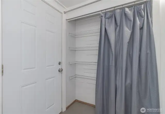Lots of extra shelving storage back in the kitchen, can be used as a pantry or whatever you need!
