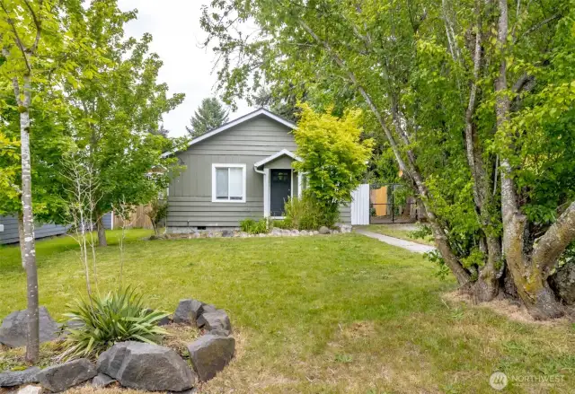 Lovely already landscaped front yard, mature trees providing privacy