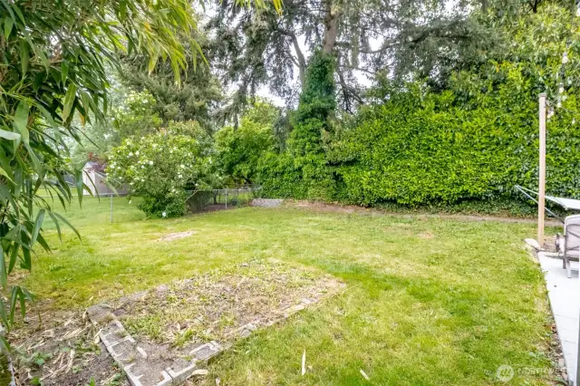 Stretch out and enjoy! This fully fenced yard offers room to roam, play, or entertain with room left over for your pups or garden dreams.
