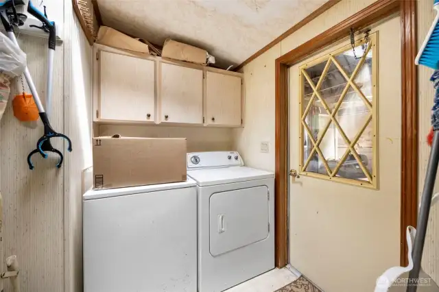 Laundry room off of kitchen, Door to back porch