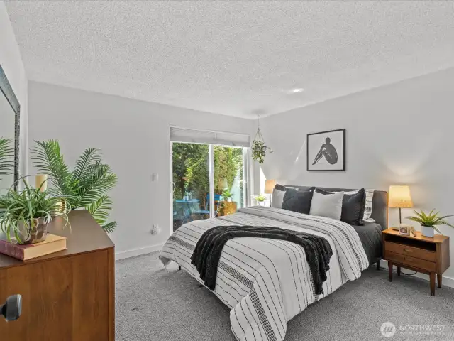 Primary bed w/ private patio access