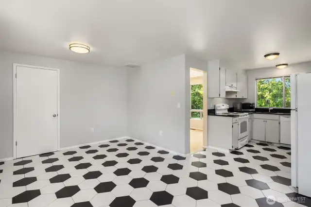 Spacious kitchen area and pantry with room for casual eating and additional seating areas.