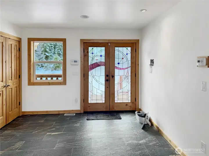 Front entry from the greatroom.  There is a half bath on the left.