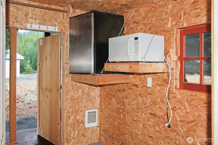 Fridge and microwave for guest snack time
