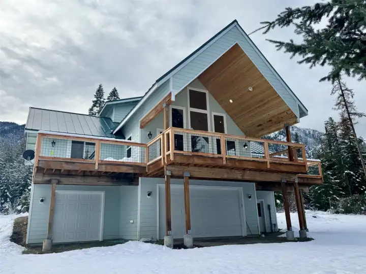 Decks span the whole back of the home.