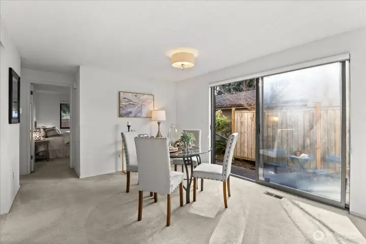 Bright and cheery Dining area with easy back patio access!