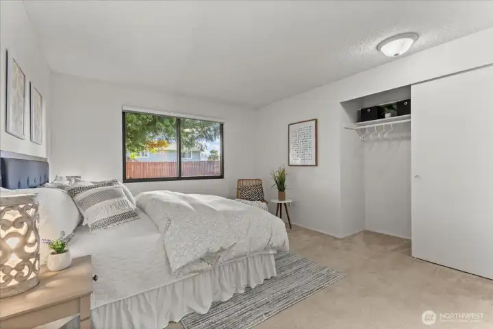 Bedroom with attached 1/2 bath. Great sized room with large closet, quad paned window that faces East.