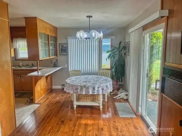 Dining room with sliding door to front patio. *Current photos unavailable due to tenancy restrictions.