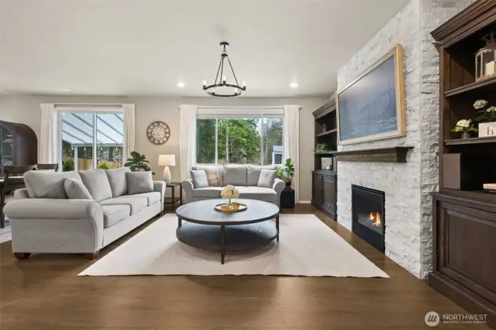 The spacious Great Room is warm and welcoming, centered around a custom fireplace. It’s the perfect place to relax after a long day. Serene greenbelt views and no homes behind offer privacy and a peaceful backdrop to everyday living.