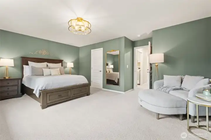 The luxurious owner’s suite offers a private retreat at the end of the day. Spa-inspired finishes elevate everyday living.