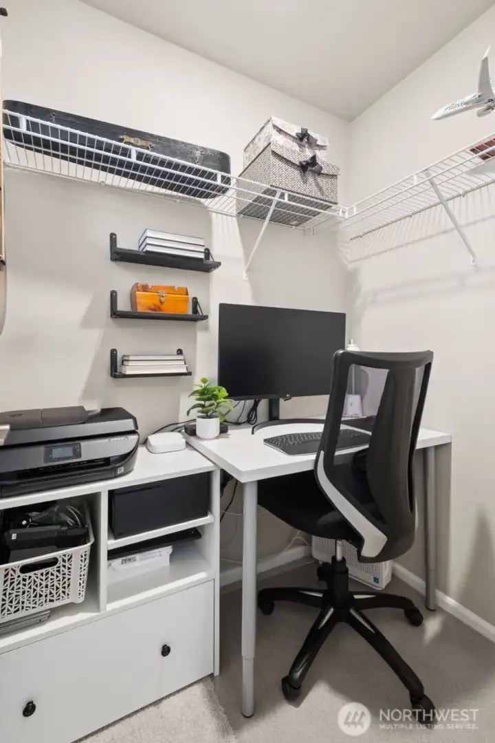 Bedroom #4 walk in closet set up as a work space.