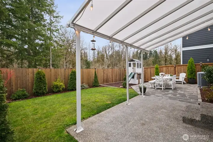 The extended outdoor living space creates room to relax, dine, and play. It’s an ideal backdrop for making memories.