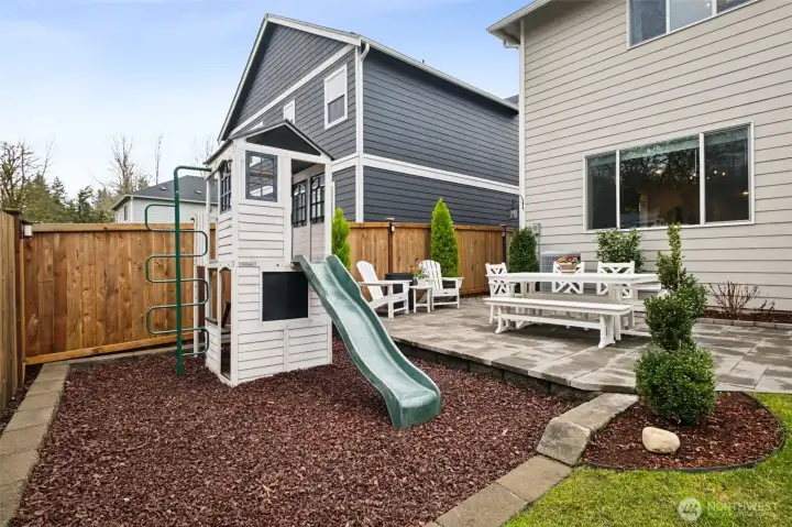 Beautifully curated for maximum enjoyment this backyard has so much to offer. The playset stays with the home.