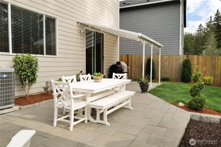 The extended outdoor living space creates room to relax, dine, and play. It’s an ideal backdrop for making memories.