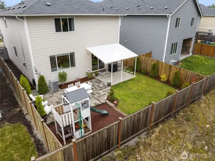 Beautifully landscaped and meticulously maintained this back yard provides the perfect space to relax or entertain.