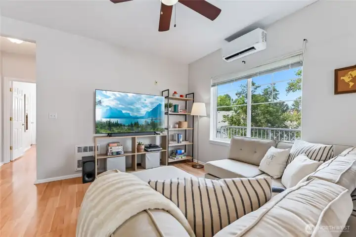 Large, windows throughout the condo brings in the sunshine. Mini-split heat duct provides warmth in winter and A/C in summer.