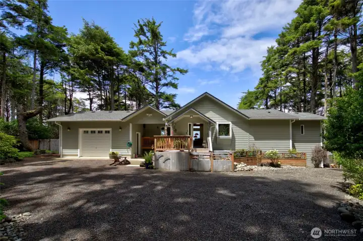 Serene, private and full of views from almost every room in the home!  Behind this front fence sits a hot tub to protect you from the wind so you can soak under the stars and among the trees.