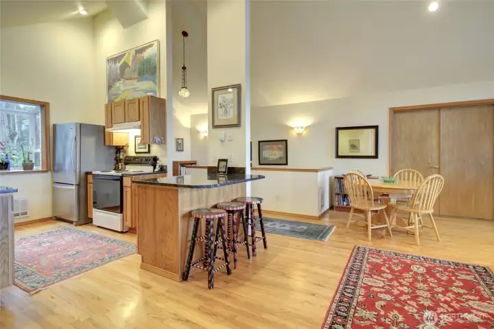 The kitchen & dining space is wide open for all to enjoy no matter what you're doing.