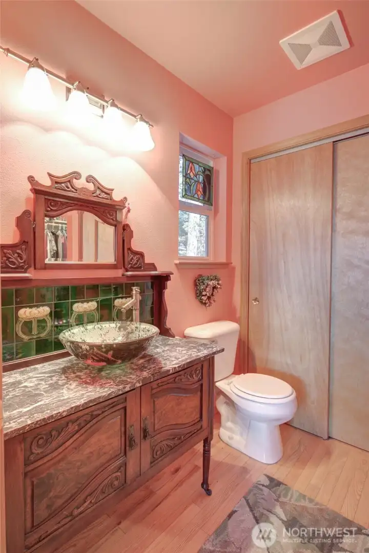 This was the original primary bath and when the new larger bath was built off the primary, the tub shower was converted to more closet space.