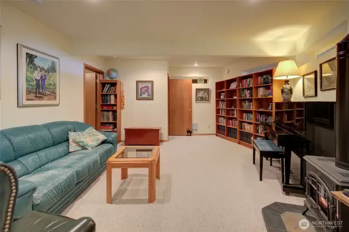Downstairs is another living space.  You could even use it as a lock off unit if you were to rent out just the upstairs.  There is a large family room with propane stove to make it extra cozy.