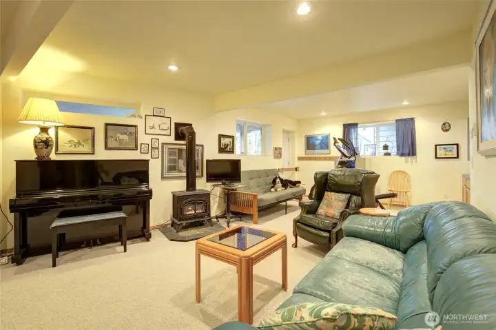 There is a door that leads to the ocean side of the yard and a greenhouse,