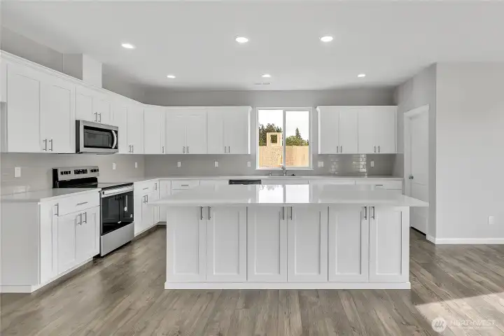 **This home is a presale** Photos are of the same plan in the community. Some colors and features will vary.