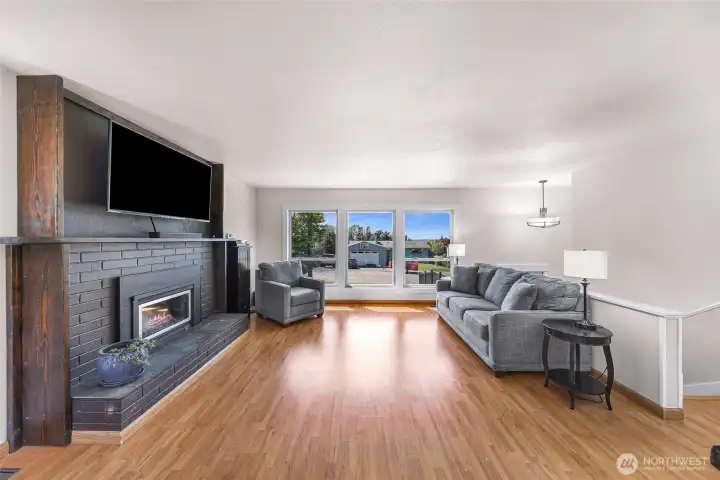 Fireplace and built in surrounds create a warm and inviting vibrance to the living space
