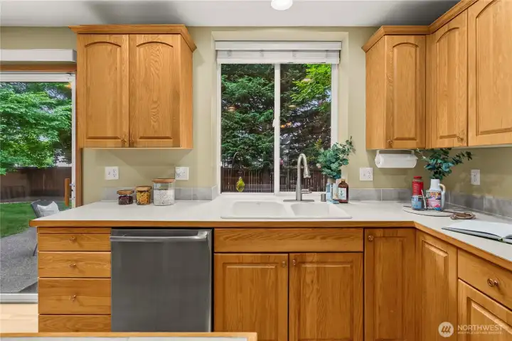 Enjoy peaceful backyard views right from the kitchen sink window.