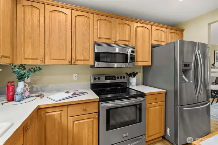 Stainless steel appliances add a sleek, modern touch to the kitchen.