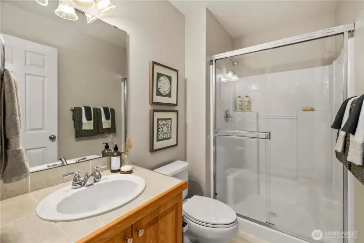 Conveniently located guest bathroom.