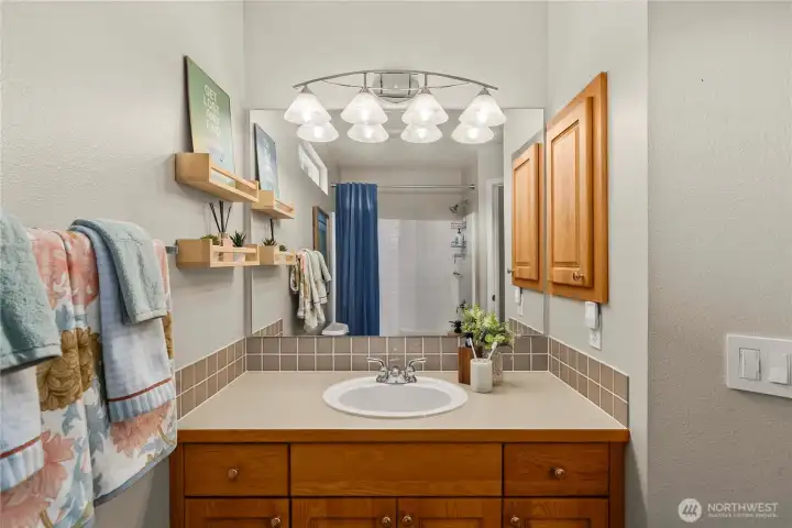Upper-level guest bathroom featuring a clean, functional design for everyday convenience.