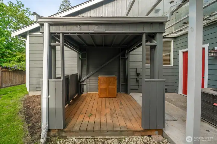 The gazebo with wood decking is wired for a hot tub. Could be used for whatever you need!