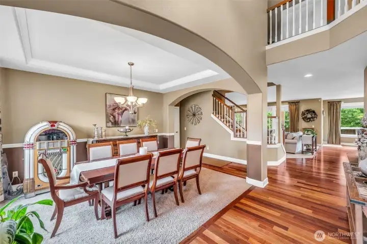 Perfect for gatherings both large and small, the dining area flows effortlessly into the heart of the home while maintaining its elegant, dedicated space. Perfect for gatherings both large and small, the dining area flows effortlessly into the heart of the home while maintaining its elegant, dedicated space.