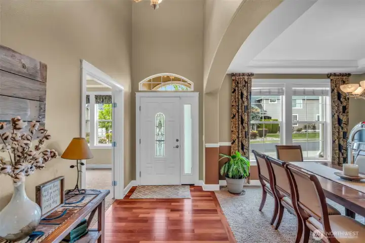 Step inside to a grand two-story foyer showcasing soaring ceilings, hardwood floors, and timeless architectural details. Step inside to a grand two-story foyer showcasing soaring ceilings, hardwood floors, and timeless architectural details.