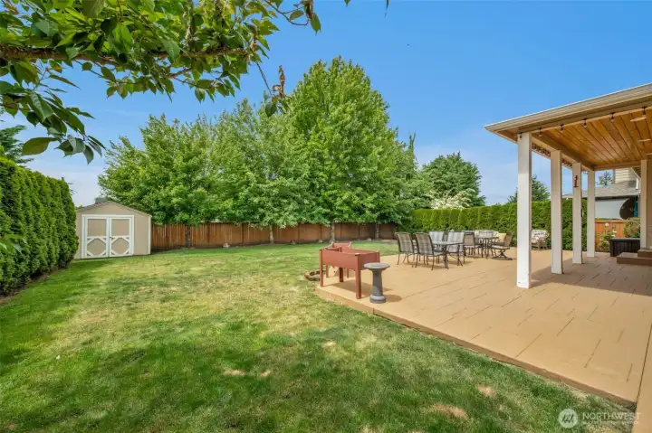 Enjoy outdoor entertaining on the oversized stamped concrete patio surrounded by mature trees and privacy hedges. Enjoy outdoor entertaining on the oversized stamped concrete patio surrounded by mature trees and privacy hedges.