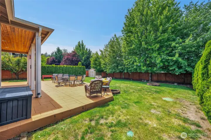 Expansive covered patio overlooking a private backyard—perfect for year-round outdoor living and entertaining. Expansive covered patio overlooking a private backyard—perfect for year-round outdoor living and entertaining.