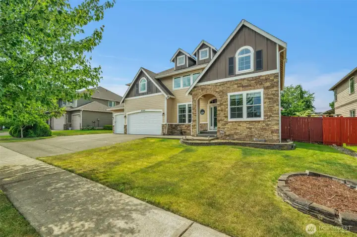 Stunning curb appeal with Craftsman-inspired architecture, stone accents, a 3-car garage, and a welcoming covered entry. Stunning curb appeal with Craftsman-inspired architecture, stone accents, a 3-car garage, and a welcoming covered entry.