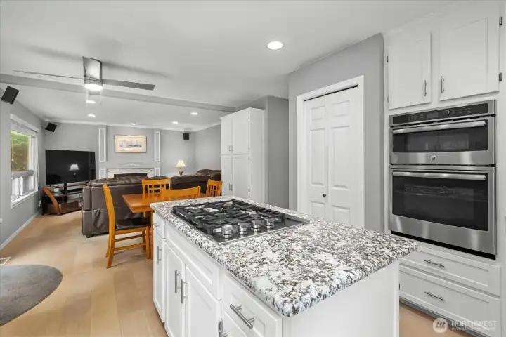 Kitchen space with gas cooktop. Stainless steel appliances.