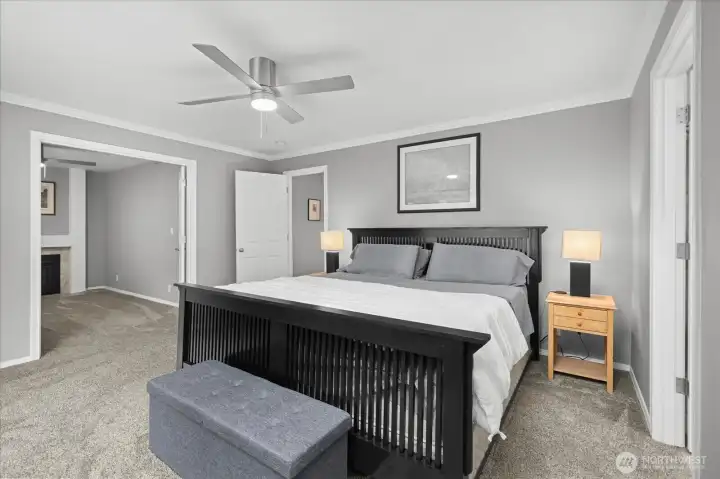 Primary bedroom with sitting area/home office and a cozy gas fireplace off the primary room.