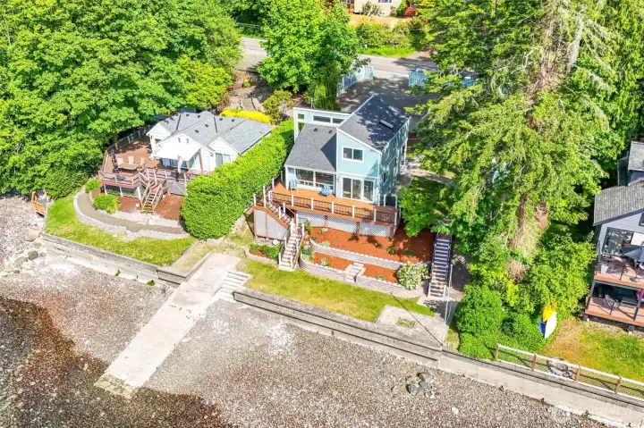 Your 77 feet of waterfront comes with a private boat ramp and a solid bulkhead — launch a kayak, swim or simply walk your 100 feet of tidelands at low tide. And here's the bonus most waterfront buyers never expect... set above and behind the bulkhead means this house does not experience flooding.