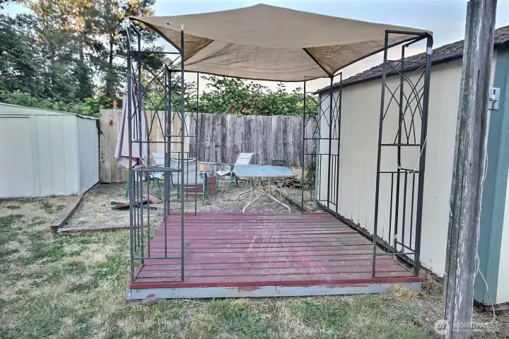 azebo and deck area with fenced outdoor setting. azebo and deck area with fenced outdoor setting.