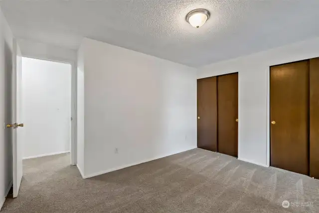 bedroom two has lots of closet space and brand-new carpet.