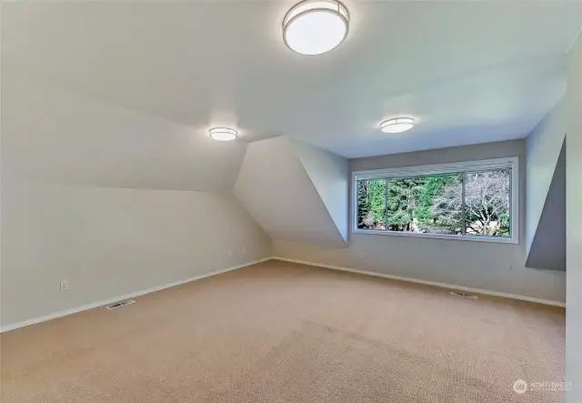 Upstairs is this great bonus room that is perfect movie nights or playroom activities.