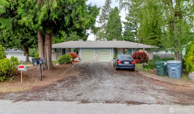 Welcome home!  Left side is vacant, right side has a tenant.  Make this yours today!