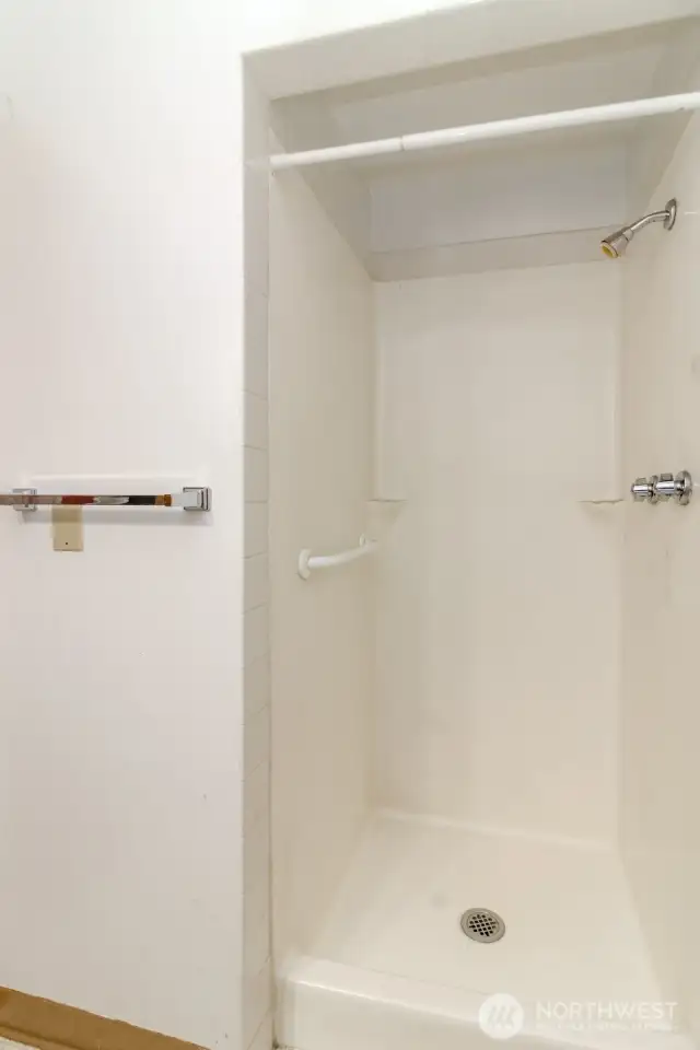 Tenant side extra/2nd bathroom shower.